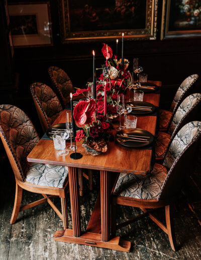 photo of a black and red wedding table styled at the cosy club in derby