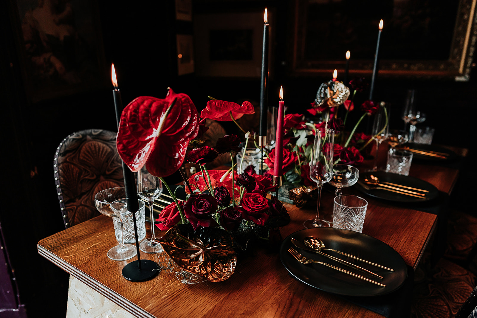 image of a black and red themed wedding table at cosy club derby