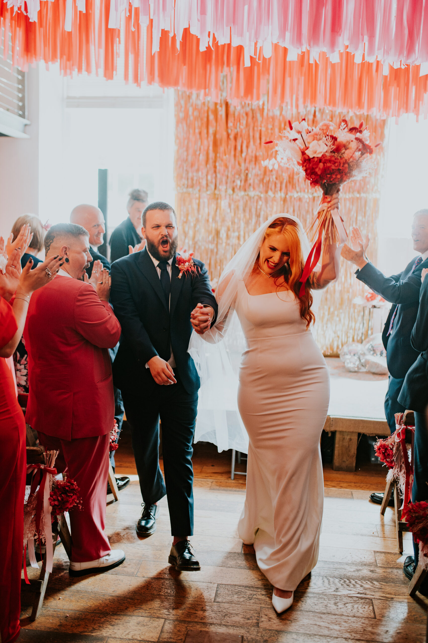 Radiant Red and Pretty Pink Wedding at The Globe in Hay: A Love-Filled Affair to Remember